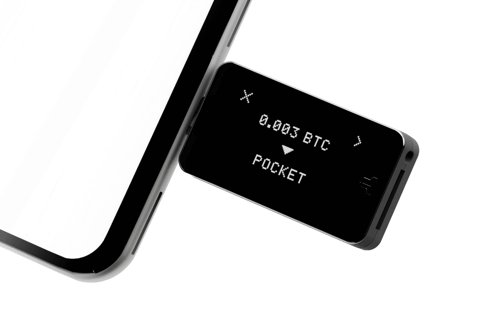 Freez Wallet hardware device attached to a phone
